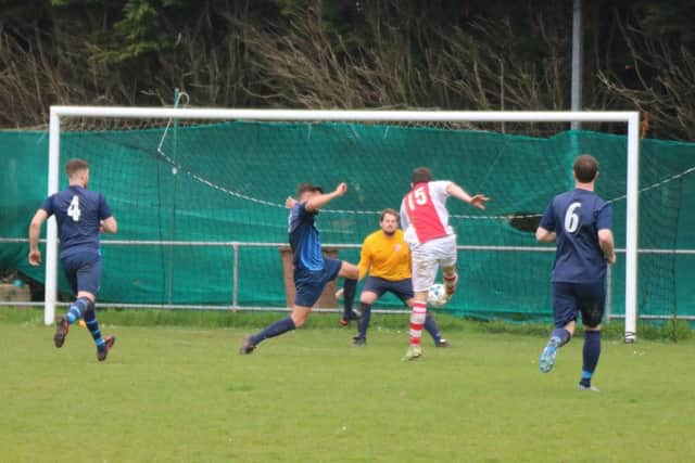 Dan Brazier lets fly with a fierce effort. Picture by Nathan Stepney