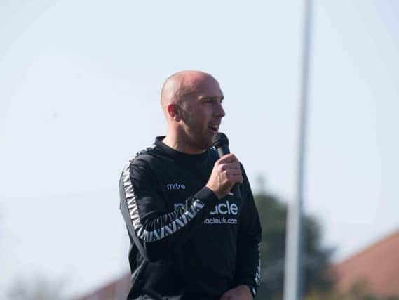 Adam Hinshelwood addresses Worthing supporters after signing a three-year contract. Picture by Marcus Hoare