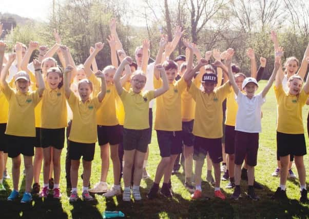 Pupils from Colgate Primary School are taking part in a daily one-mile run before lessons. Photo: Katie Battie Photography SUS-180423-110510001