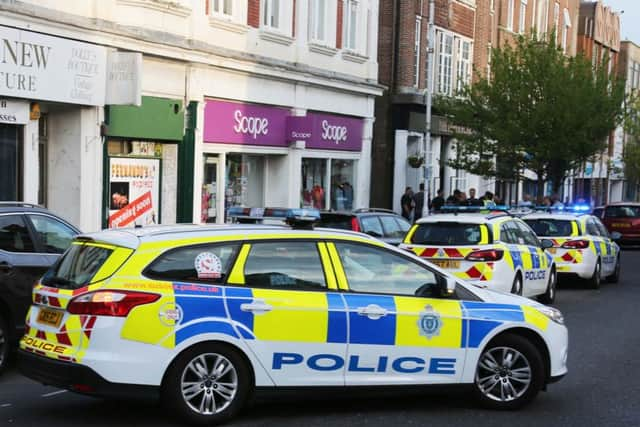 Police at the scene. Photo: Eddie Mitchell