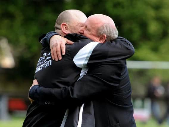 Ian Chapman and Hillians chairman Kevin Newell celebrating survival last season