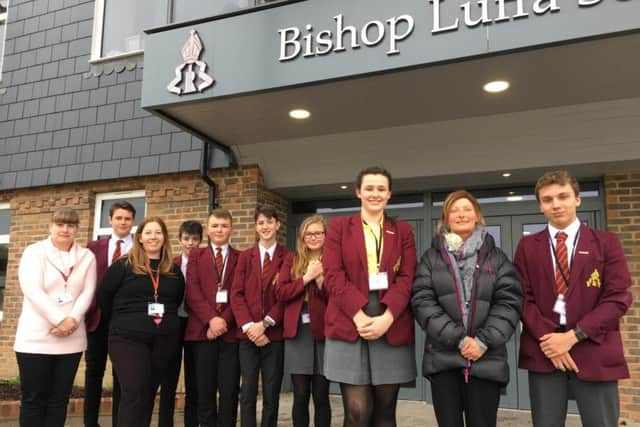 Mel de Lacy (front) next to Kate Rowbotham and Joe Clines, both 14, who are behind the school's efforts, along with fellow students and teachers taking part.