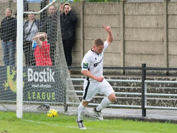 Pat Harding scores against Harrow. Picture by Chris Neal