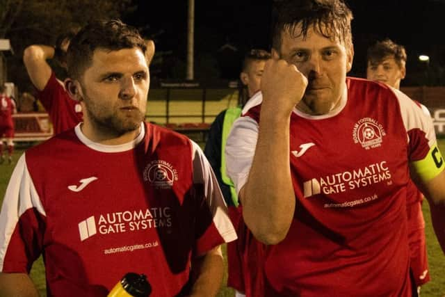 Cup winners - Bosham players celebrate / Picture by Tommy McMillan