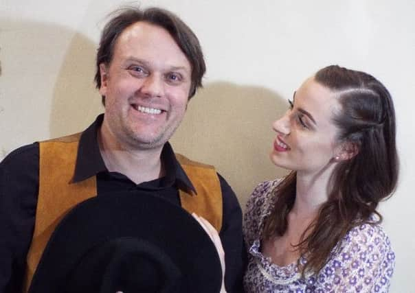 Gareth Ashley as Curly McLain and Megan OHara as Laurey Williams