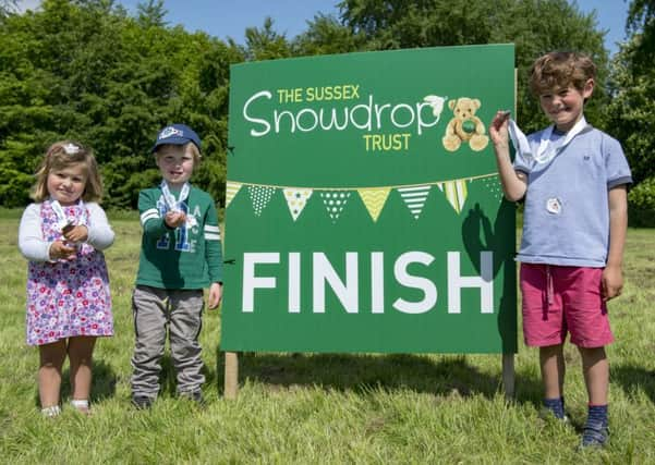 Each walker received a free water bottle and a finishing medal