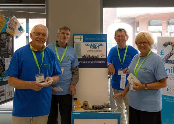 Shoreham Foodbank volunteers collect the goods from donation points