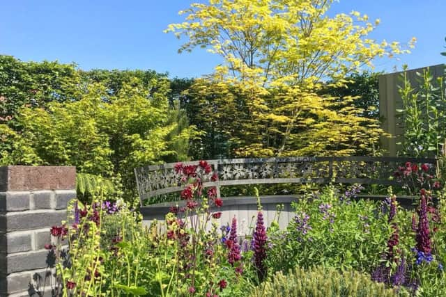 Shoreham designer Naomi Ferrett-Cohen has created The CHERUB HIV Garden: A Life Without Walls. Images taken by Prof John Frater