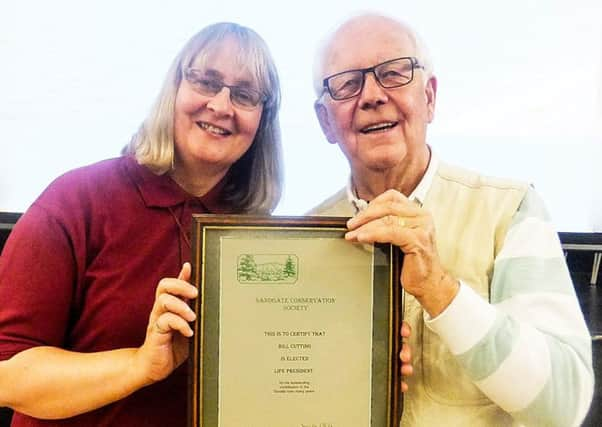 Jacinta White presents Bill Cutting with his certificate of office. Photo: Brian Burns SUS-180530-121902001