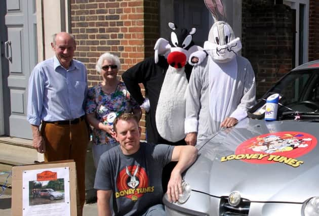 'Looney Tunes' dad and son with the family before they set off