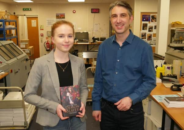 Teenage author Juliet Webber with her dad Nick SUS-180531-151218001