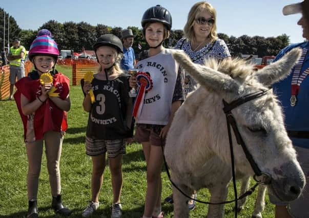 Adur District Council chairman Joss Loader presented rosettes after the final race. Picture: Southwick Camera Club