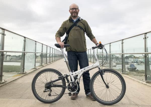 Clive Andrews with his bike in Shoreham. Photo: Adam Bronkhorst