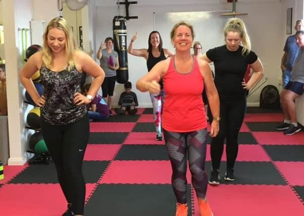 Tracey Shaughnessy with supporters during the lungeathon at PW Physique and Fitness