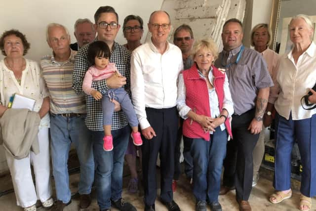 MP Nick Gibb with Wayne McConnell and other residents of South Terrace who were affected by flooding