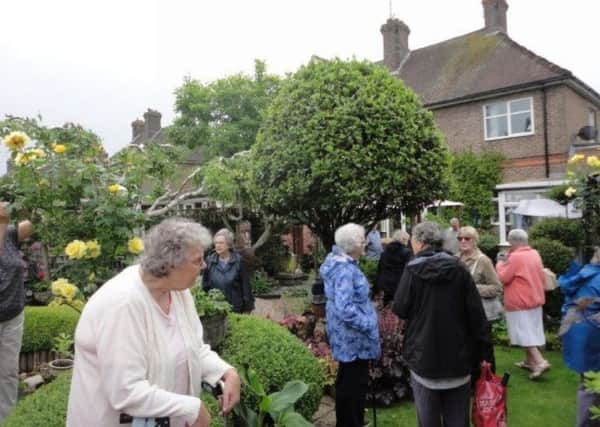 Midhurst WI members exploring the garden