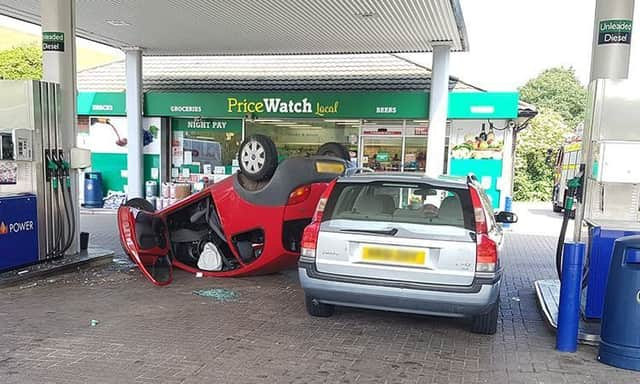 The scene at the petrol station on the A27 near Lewes. Photographs by Eddie Mitchell