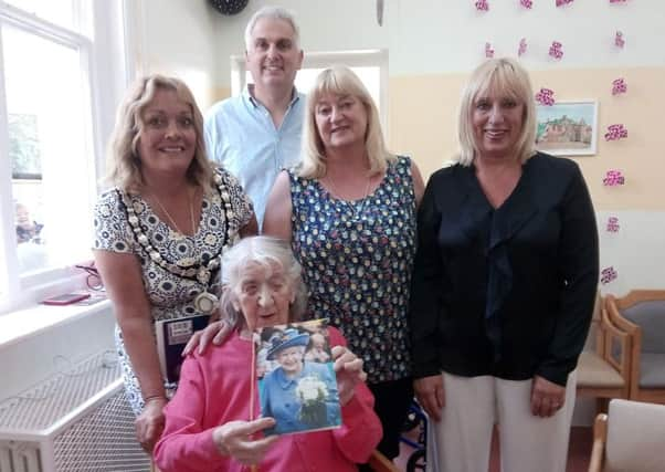 Eileen Hillman with Adur District Council chairman Joss Loader and family, twins Maggie and Roz and son-in-law Lee Balthazor