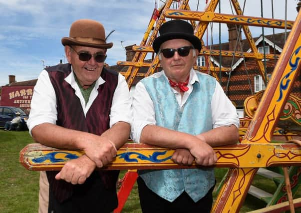 Paul Fells (left) and John Long of Harris's Old Tyme Amusements. Photograph by Liz Pearce (SUS-180624-133359008)