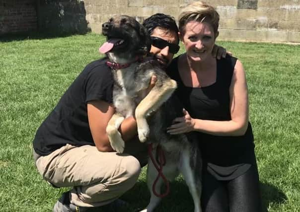 New owners Fiona and Douglas with Saffron, who has been rehomed from Wadars after more than two years with the charity