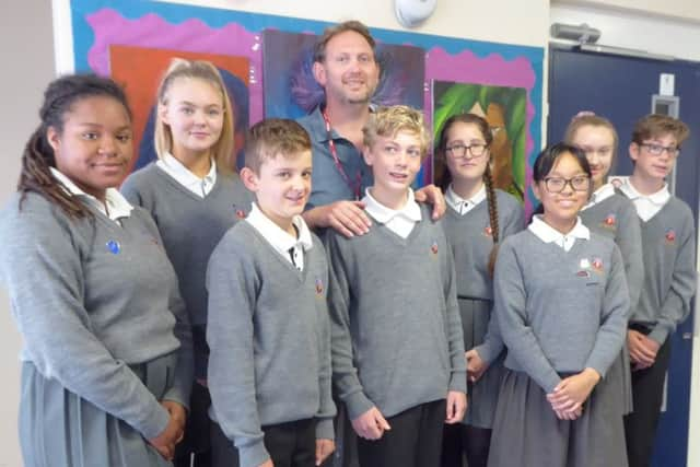 Thomas Taylor with a group of St Richard's pupils. Photo by Jean Clark