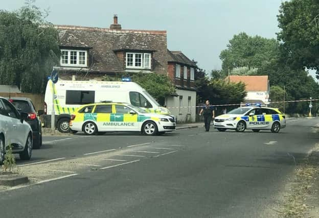 Police and paramedics at the scene. Picture by Eddie Mitchell SUS-180107-163341001