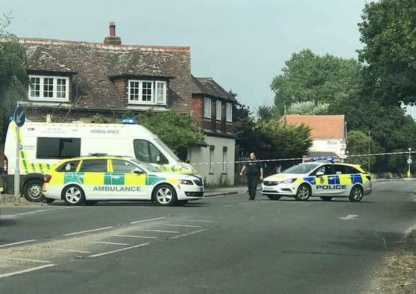 Police and paramedics at the scene. Picture by Eddie Mitchell