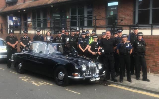 Sergeant Ian Cooke (front right with no hat) with members of Adur and Worthing police SUS-180307-171458001