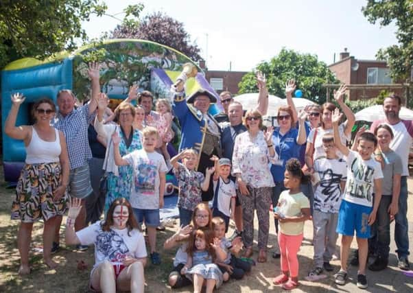 Worthing deputy mayor Hazel Thorpe and town crier Bob Smytherman join Reaching Families for its tenth anniversary celebrations u8Y0vDgSjwAd5oLC2klZ