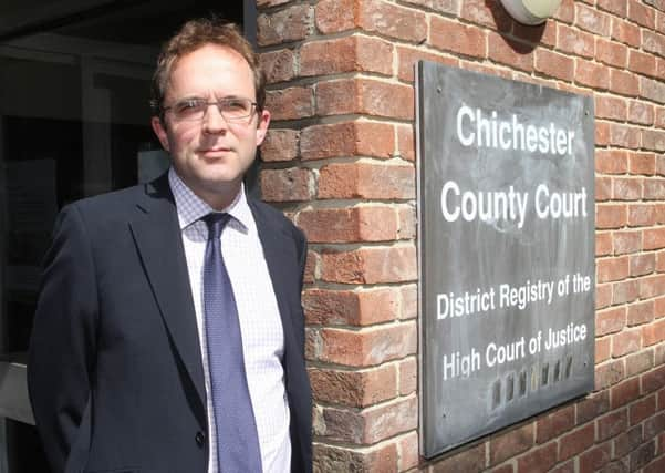 DM17840704a.jpg Lawyer Edward Cooke outside Chichester County Court. Photo by Derek Martin SUS-170817-171005008