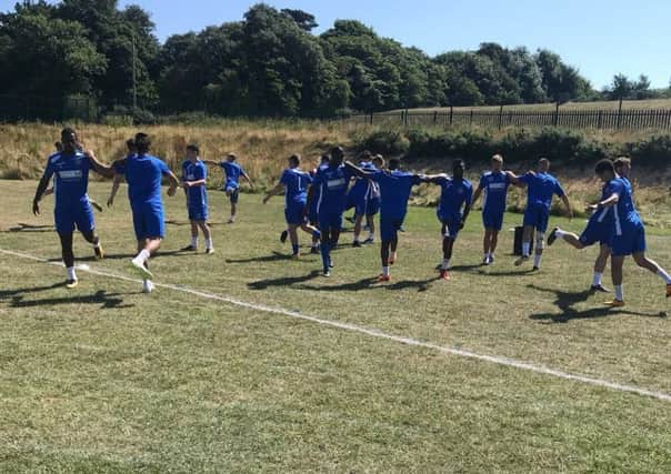 Hastings United Football Club's players are put through their paces in their first pre-season training session.