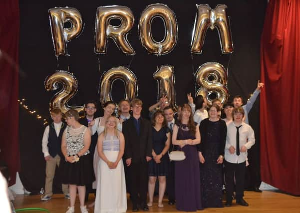 Youngsters dressed in fancy frocks and smart suits