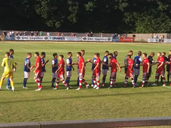 Crawley and Ipswich players ahead of friendly at East Court.