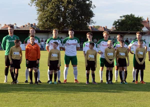 Southway Primary School pupils act as mascots as the Rocks' friendly with Brighton