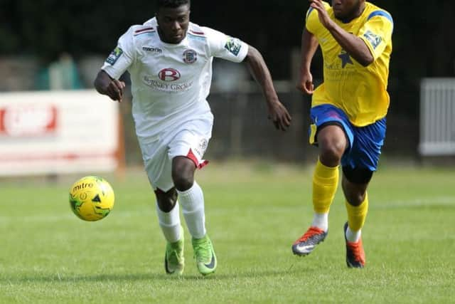 Daniel Ajakaiye on the run against Kingstonian. Picture courtesy Scott White