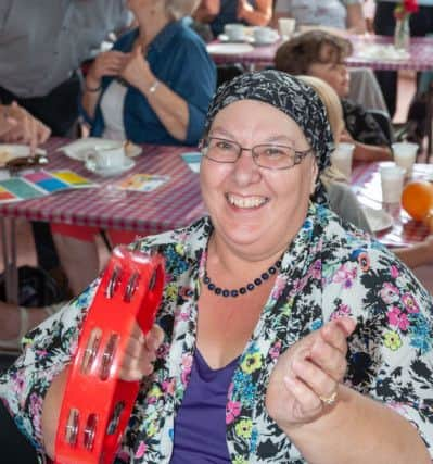 A free family cream tea was held at Wick Hall, Wick Village, Littlehampton to celebrate the start of Wick Week 2018. Pictured: a visitor enjoys the event.