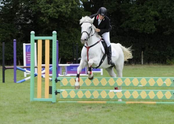 Please byline Frank Copper, because he did this free of charge.

St Michael's Hospice Riding Club's Annual Show at Catsfield. ENGSUS00120130909102826