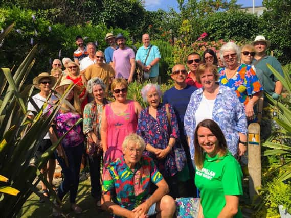 Green fingers ... some of the garden owners on the trail