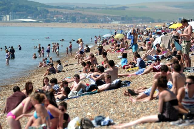 Enjoying the sunshine on Seaford Beach