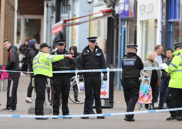 Police at the scene. Photo: Eddie Mitchell