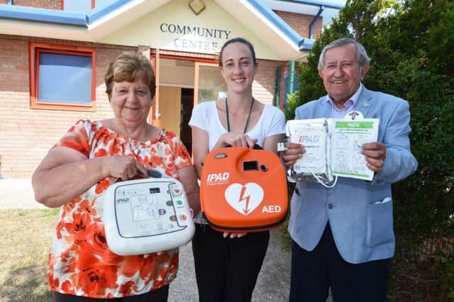 Councillor Pat Hearn, Hannah Doel (community centre project assistant) and Councillor Colin Swansborough at Willingdon Trees Community Centre