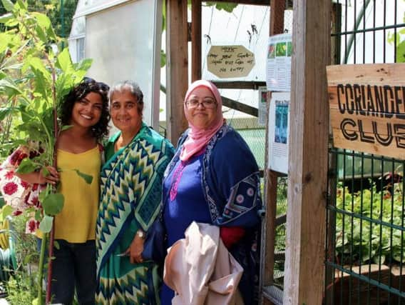 Ratna Jan Bibi, TDC community development worker, Lutfun Hussain, founder of The Coriander Club and Mishruna Kubria, Moulsecoomb Bangladeshi Women's Group co-ordinator