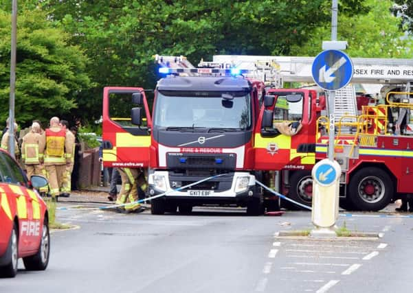 Firefighters at the scene of the balze in Battle Road