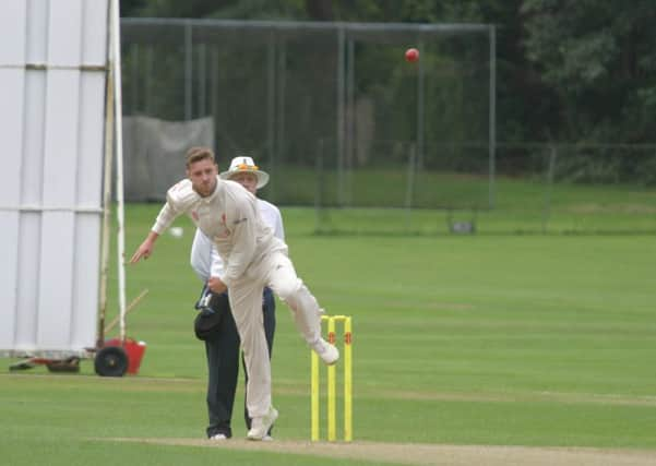 Joe Ashmore bowling for Horsham CC 1st XI. Photo by Clive Turner