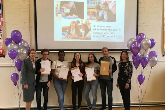 Mrs Price, headteacher (left) and Katherine Laux, chair of governors (right), with some students at King's School on GCSE results day