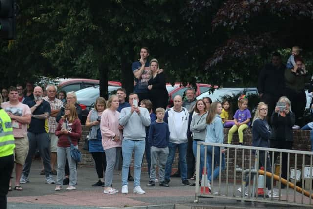 Crowds gathered opposite as firefighters tackled the blaze