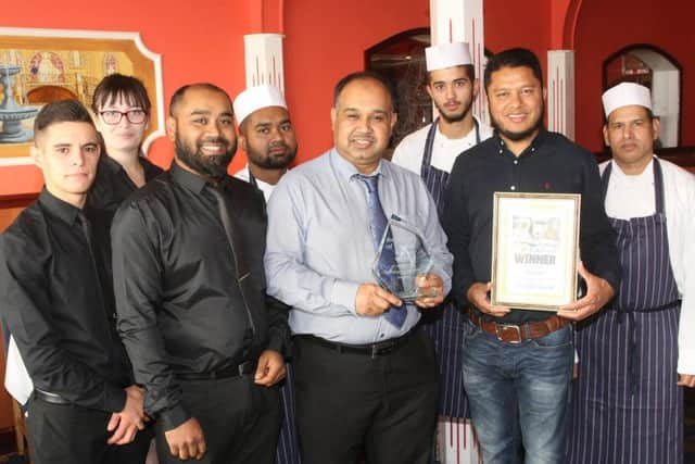 Askor Ali and his team at Mahaan, the Herald and Gazette Restaurant of the Year 2018. Photo by Derek Martin DM1891219a