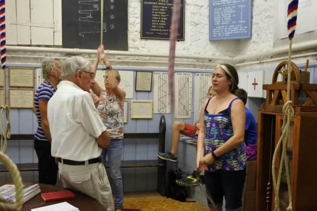 Amanda Rubython ringing the bells at the church