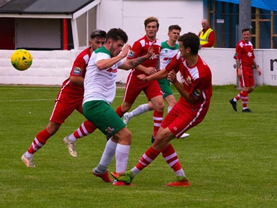 The Rocks battle away at Whitstable / Picture by Tommy McMillan