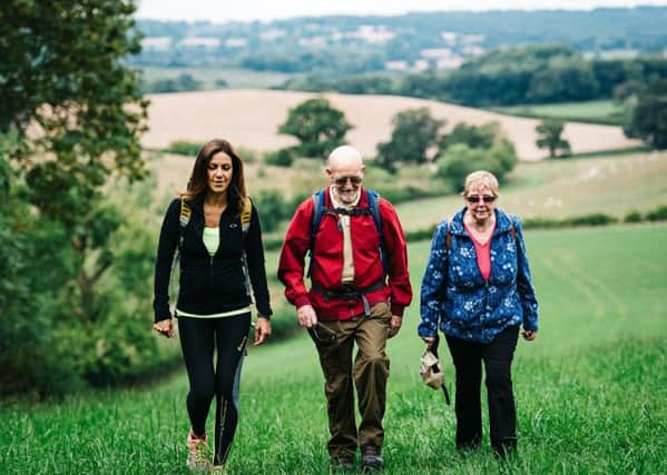 Julia Bradbury with Durrants Village residents Roger and Margaret Chaplin